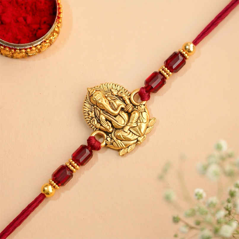 Ganesh Designer Rakhi with Roli Chawal Pack | Gift for Brother Bhaiya | Ecraftindia Ganesh Designer Rakhi with Roli Chawal Pack | Gift for Brother Bhaiya | Ecraftindia