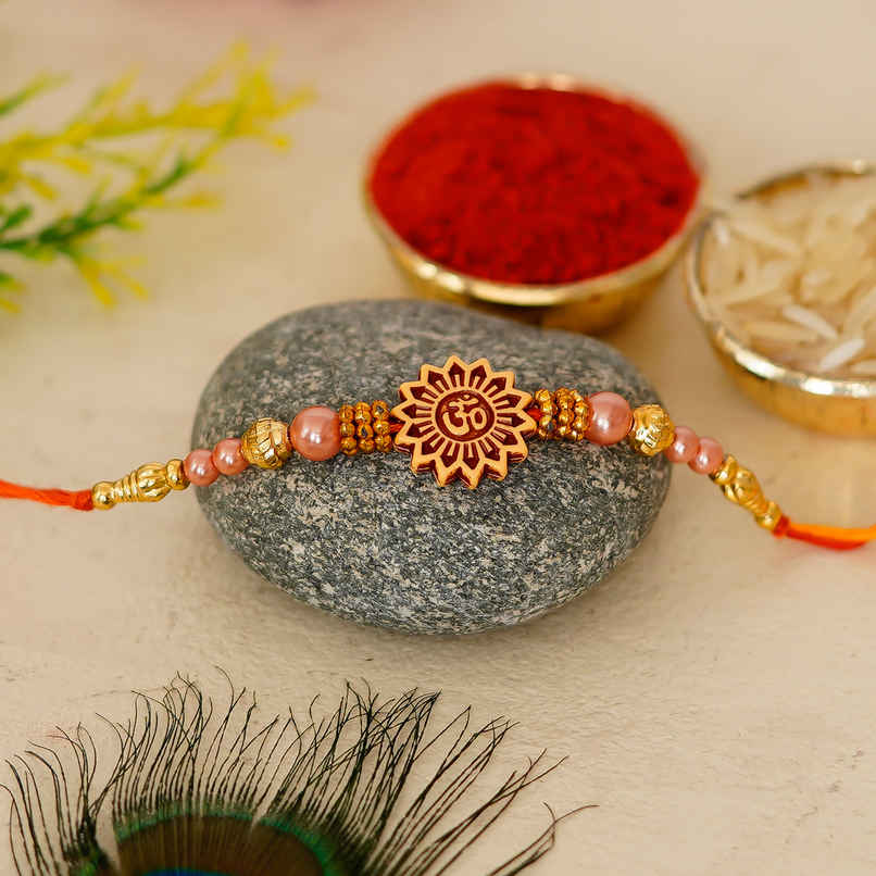 Red Yellow Om Designer Rakhi with Roli Chawal for Brother | Religious | Pack of 1 | Ecraftindia Red Yellow Om Designer Rakhi with Roli Chawal for Brother | Religious | Pack of 1 | Ecraftindia