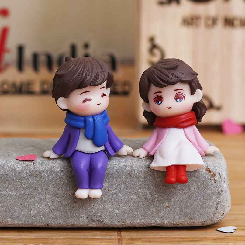 eCraftIndia Cute Boy and Girl Sitting Couple Statue Showpiece