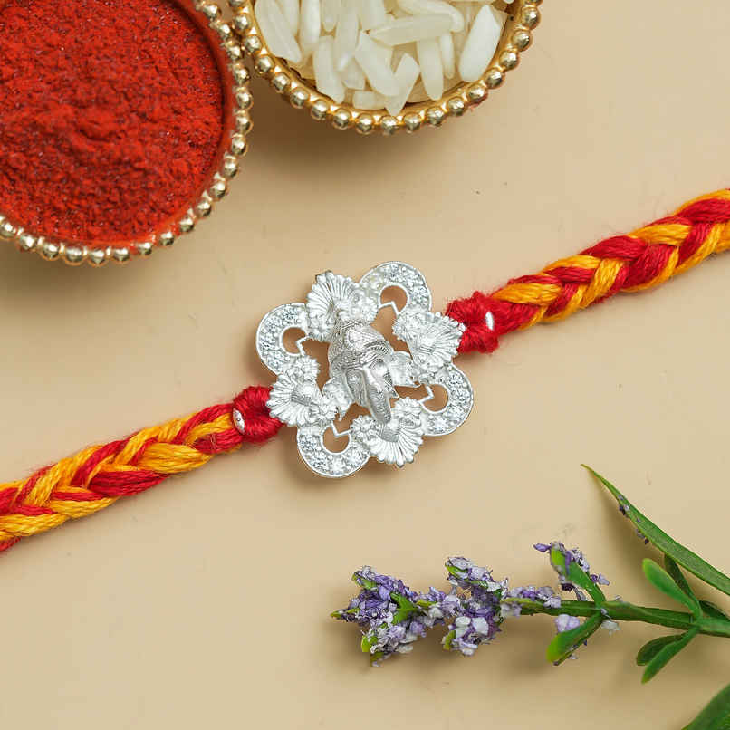 Silver Ganesha Rakhi for Brother with Roli Chawal | Pack of 1 | Ecraftindia Silver Ganesha Rakhi for Brother with Roli Chawal | Pack of 1 | Ecraftindia