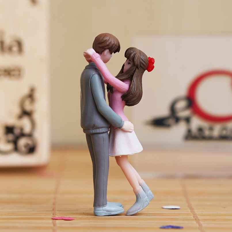 eCraftIndia Romantic Hugging Couple Statue Decorative Showpiece eCraftIndia Romantic Hugging Couple Statue Decorative Showpiece