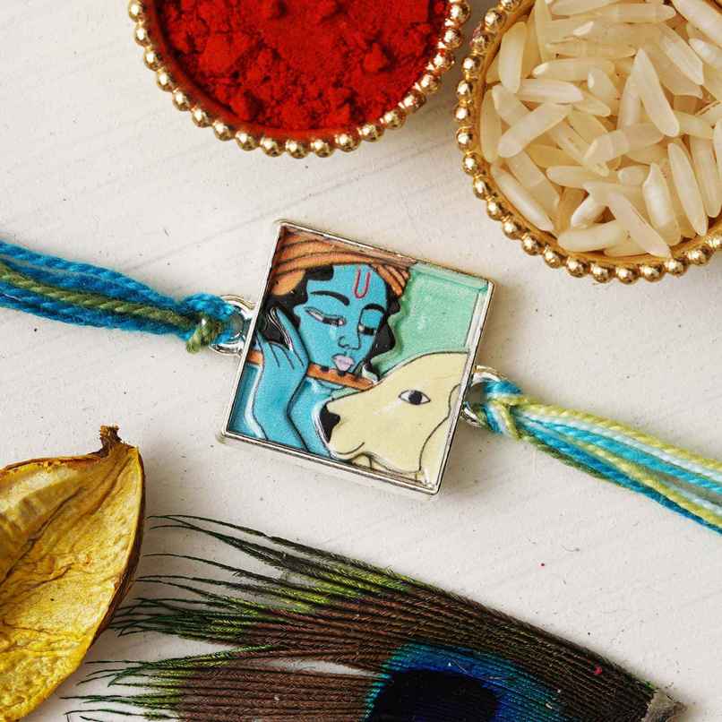 Krishna Flute Cow Religious Rakhi with Roli Chawal Pack Rakhi for Brother Bhaiya Bhai | Ecraftindia Krishna Flute Cow Religious Rakhi with Roli Chawal Pack Rakhi for Brother Bhaiya Bhai | Ecraftindia