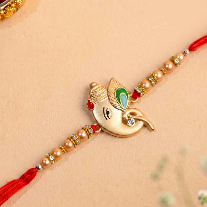 Rakhi for Brother | Ganesha Designer | Religious | Includes Roli Chawal | Pack of 1 | Tied Ribbons