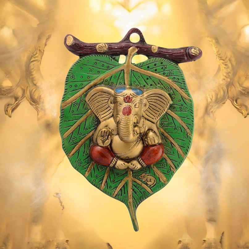 eCraftIndia Lord Ganesha in Red Dhoti on Green Leaf Wall Hanging