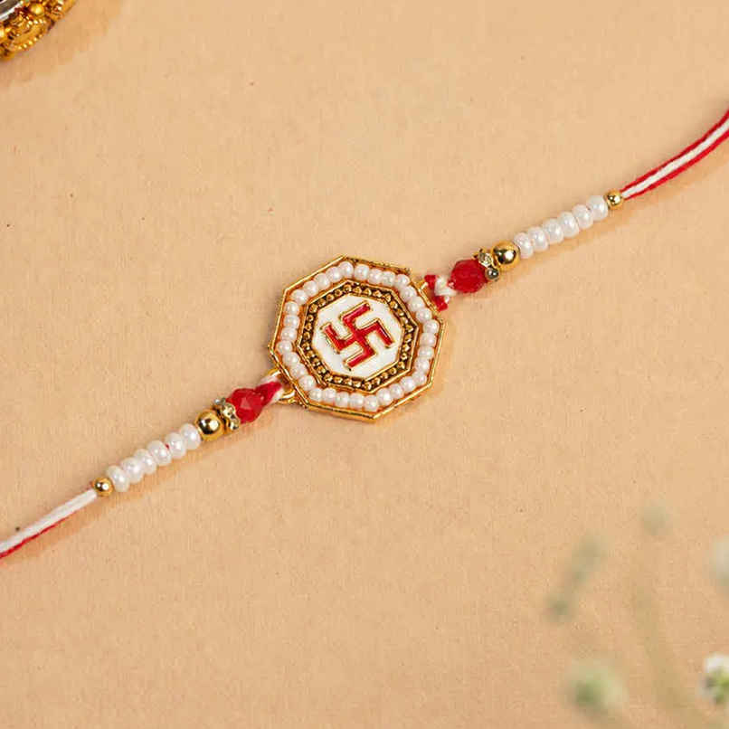 Rakhi for Brother | Swastik Meenakari Red & White Pearl | Religious Om | Pack of 1 | Tomuncle