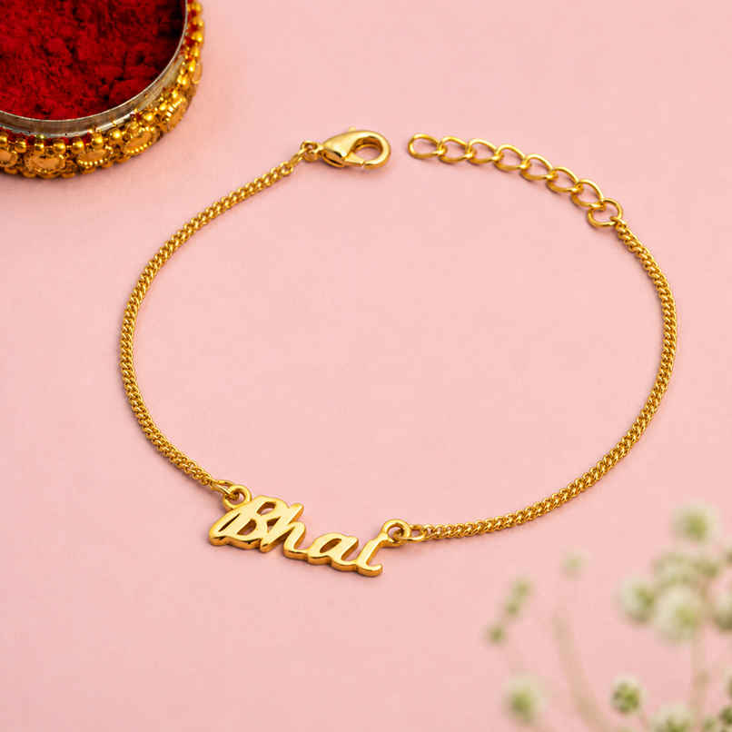 Rakhi Bracelet | Gold-Toned Engraved "Bhai" | Includes Roli Chawal | Pack of 1 | Voylla Rakhi Bracelet | Gold-Toned Engraved "Bhai" | Includes Roli Chawal | Pack of 1 | Voylla