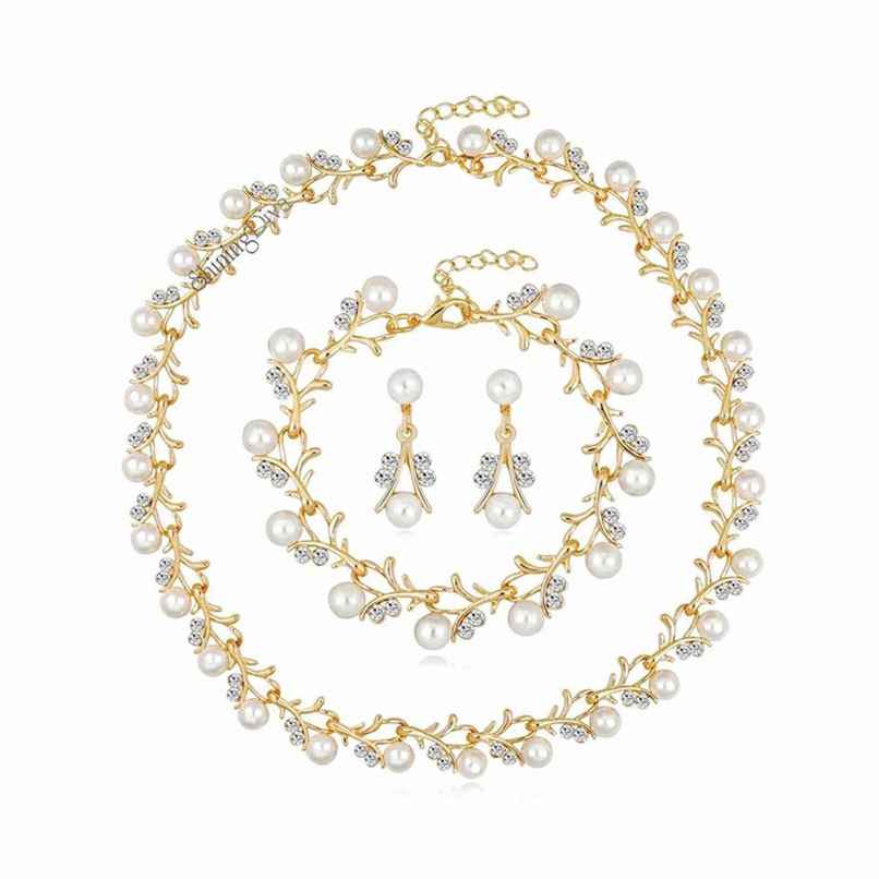 Shining Diva Fashion Gold Plated Pearl Necklace Earrings Bracelet Set for Women and Girls Sd10333s Shining Diva Fashion Gold Plated Pearl Necklace Earrings Bracelet Set for Women and Girls Sd10333s