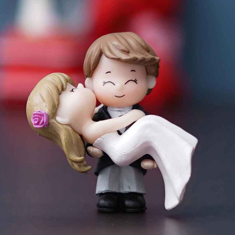 Casacraft by Pepperfry Bride Kissing Groom Romantic Black & White Polyresin Decorative Figurine