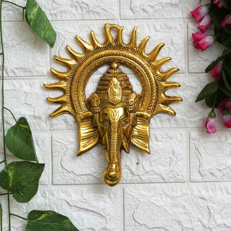 Golden Lord Ganesha Face With Sun Decorative Metal Wall Hanging Showpiece | Ecraftindia Golden Lord Ganesha Face With Sun Decorative Metal Wall Hanging Showpiece | Ecraftindia