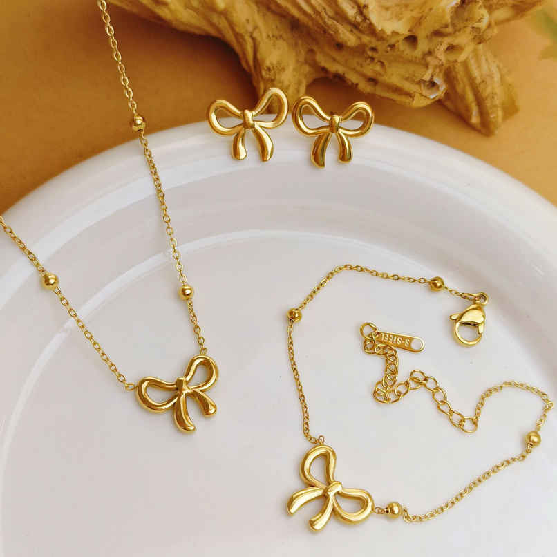 BeautyNX Gold Bow Necklace, Bracelet & Earrings Combo Set for Women BeautyNX Gold Bow Necklace, Bracelet & Earrings Combo Set for Women