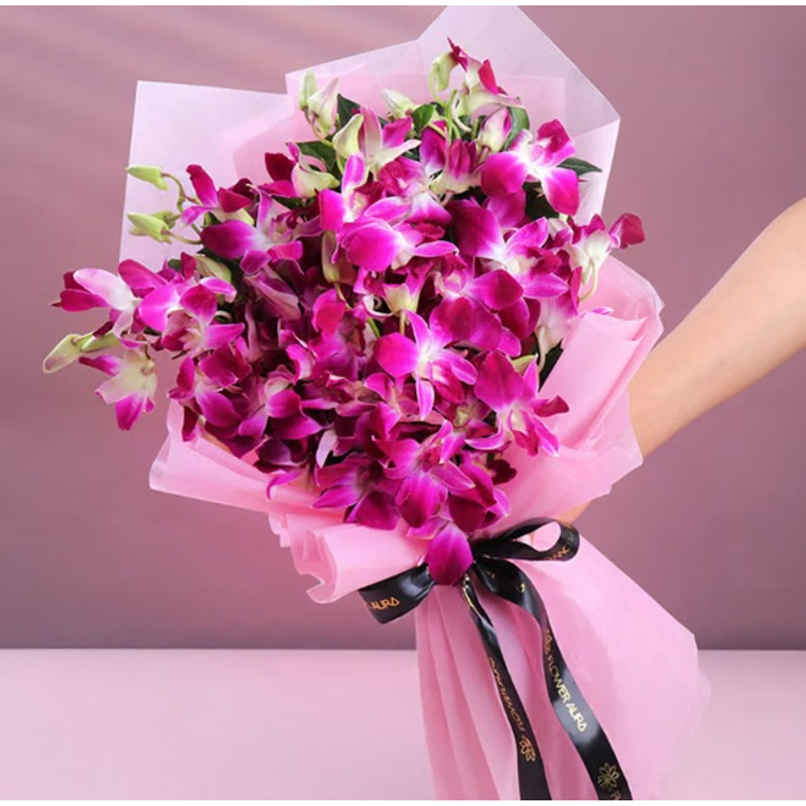 FlowerAura Purple Orchids Bouquet in Pink Wrap