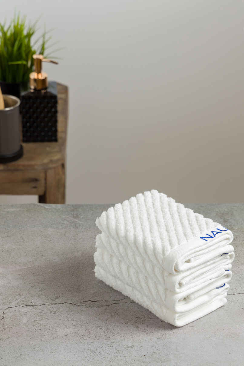 NAUTICA Fluffy Zero Twist 100 Percent Cotton Face Towel | Cross View | Solid White