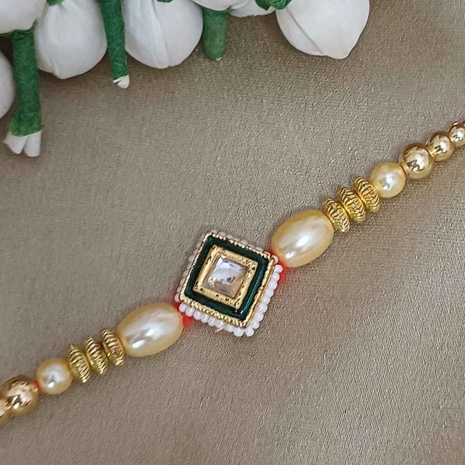 Gullak Rajasthani Square Pendant Kundan Motiwork Rakhi - Traditional and Ornate