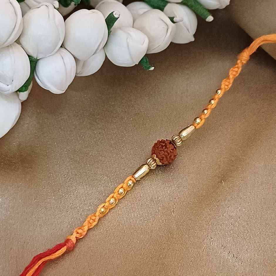 Rudraksh Yellow Mauli Gold Moti Beaded Rakhi - Buy at ₹9 Online ...