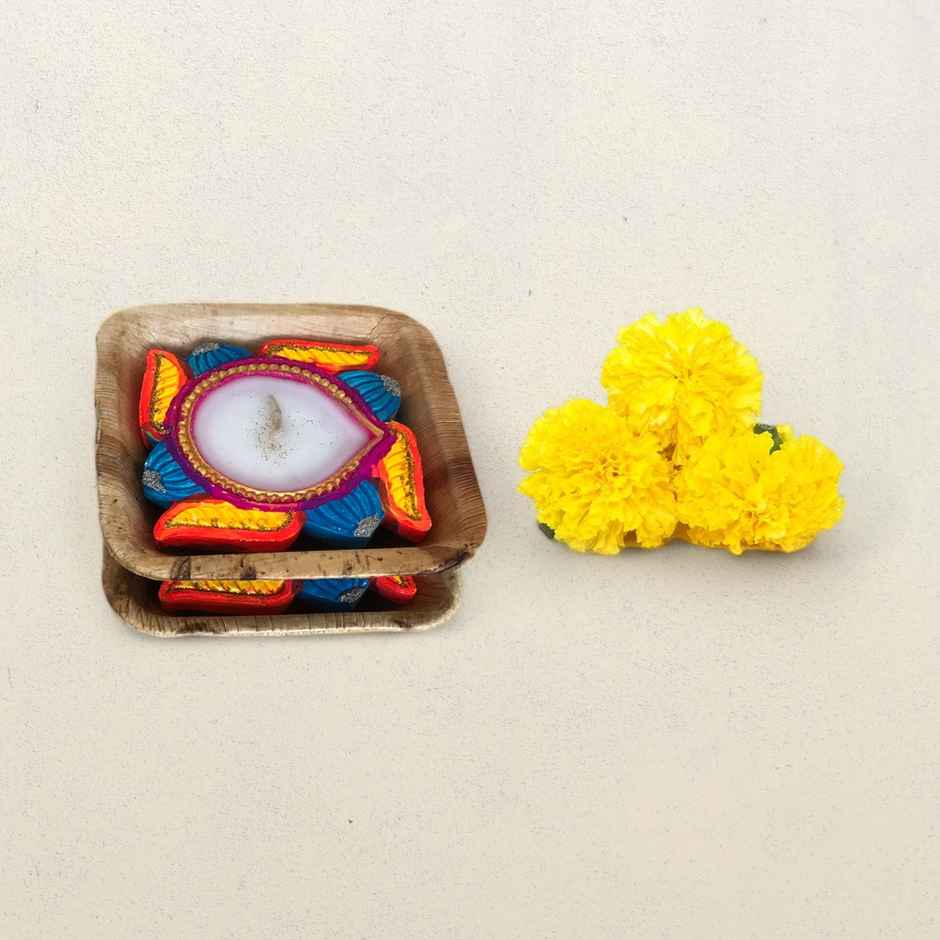 Swastik Diya(2pc) & Fresh Marigold Flower Yellow(100gms) Combo