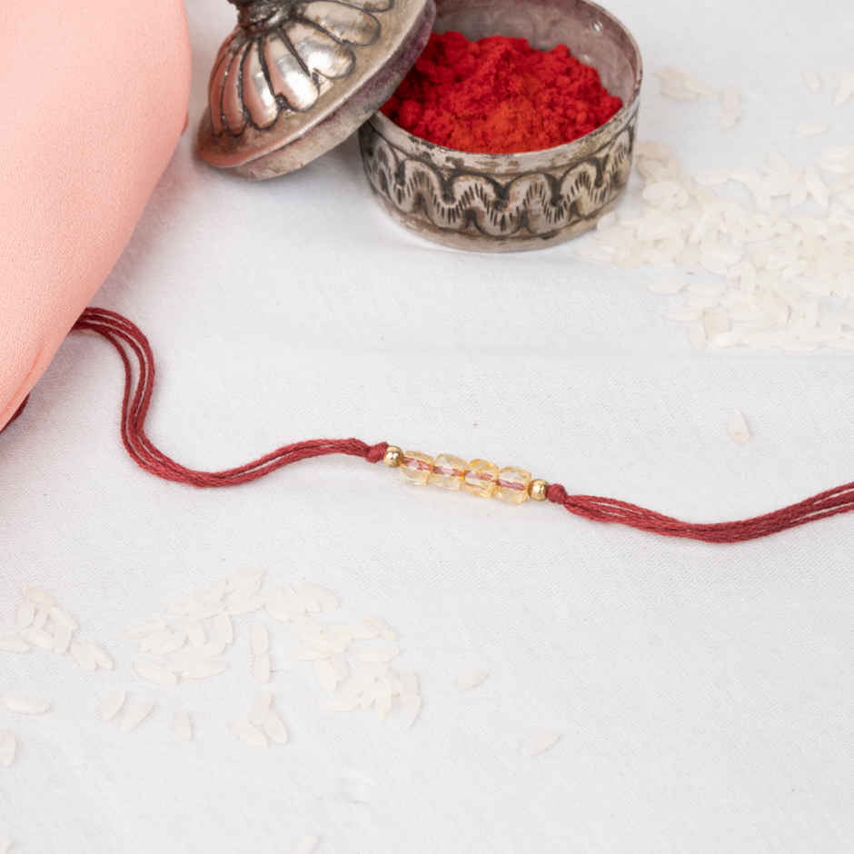 Amul Frozen Rasmalai(500gms) & Abundance & Prosperity Thread Rakhi(1pc) Combo