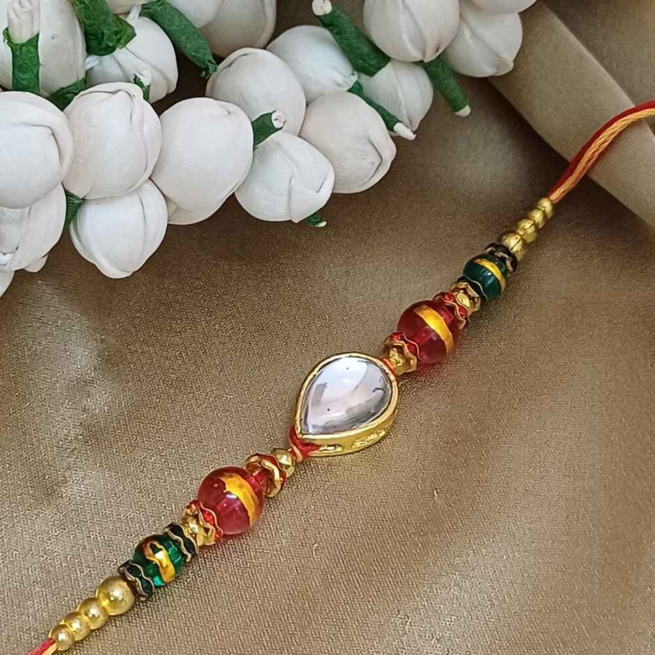 Rain Drop Stone Metal Rakhi | Elegant and Unique | Gullak