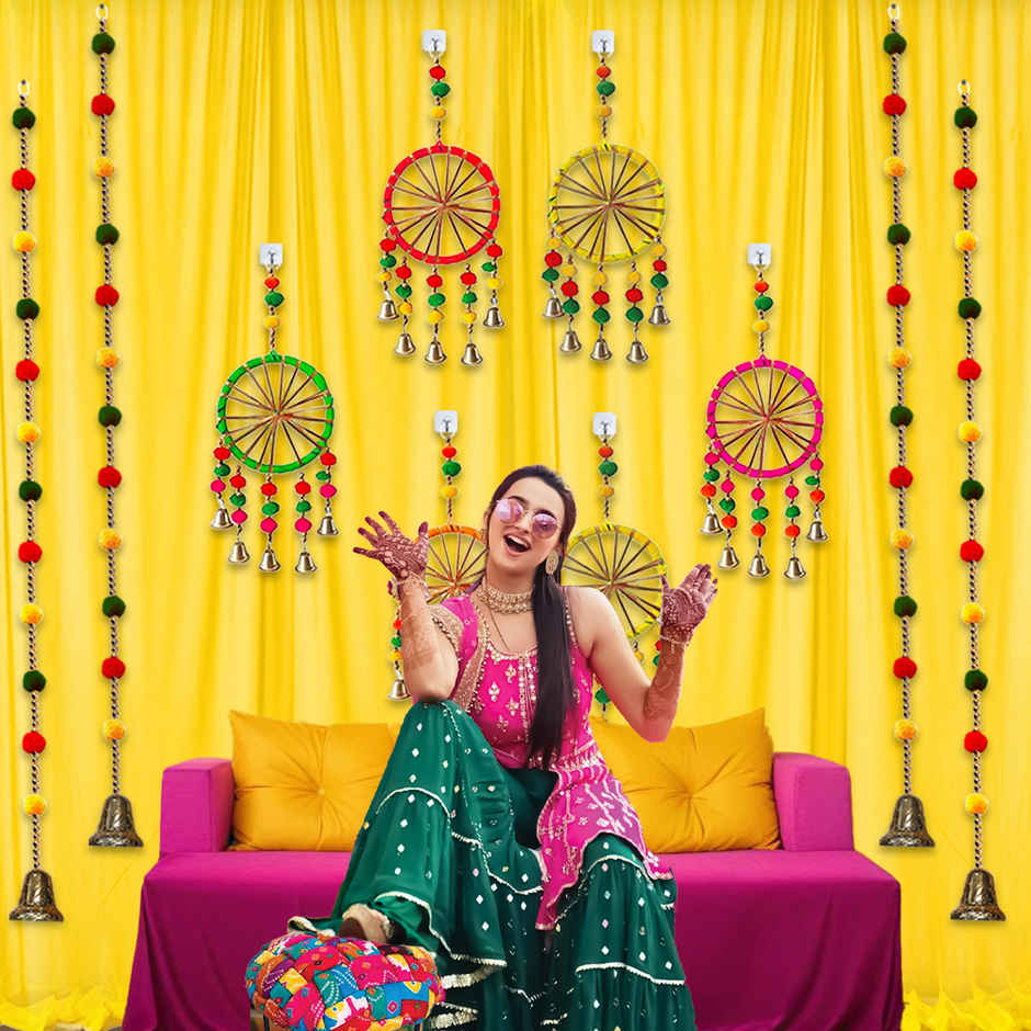 Yellow Backdrop Cloth with Pom Pom Hangings for Haldi Decoration | Party Propz