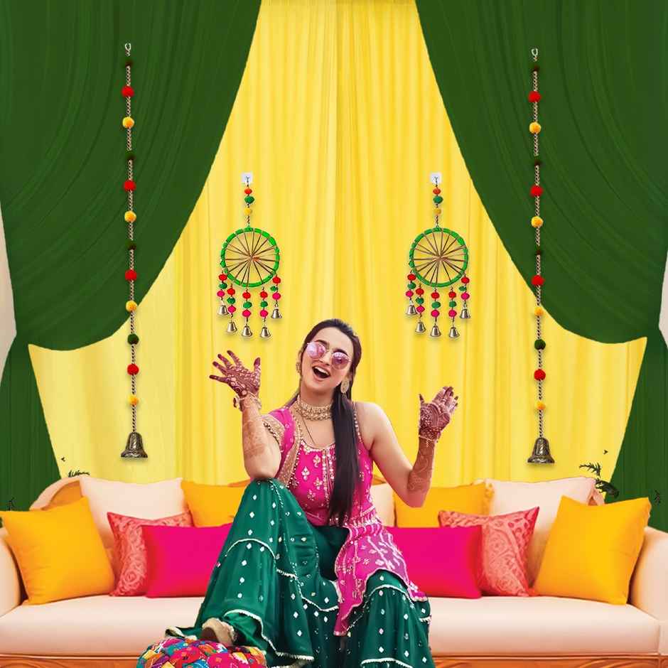 Green and Yellow Backdrop with Pom Pom Hangings for Haldi Mehndi | Party Propz