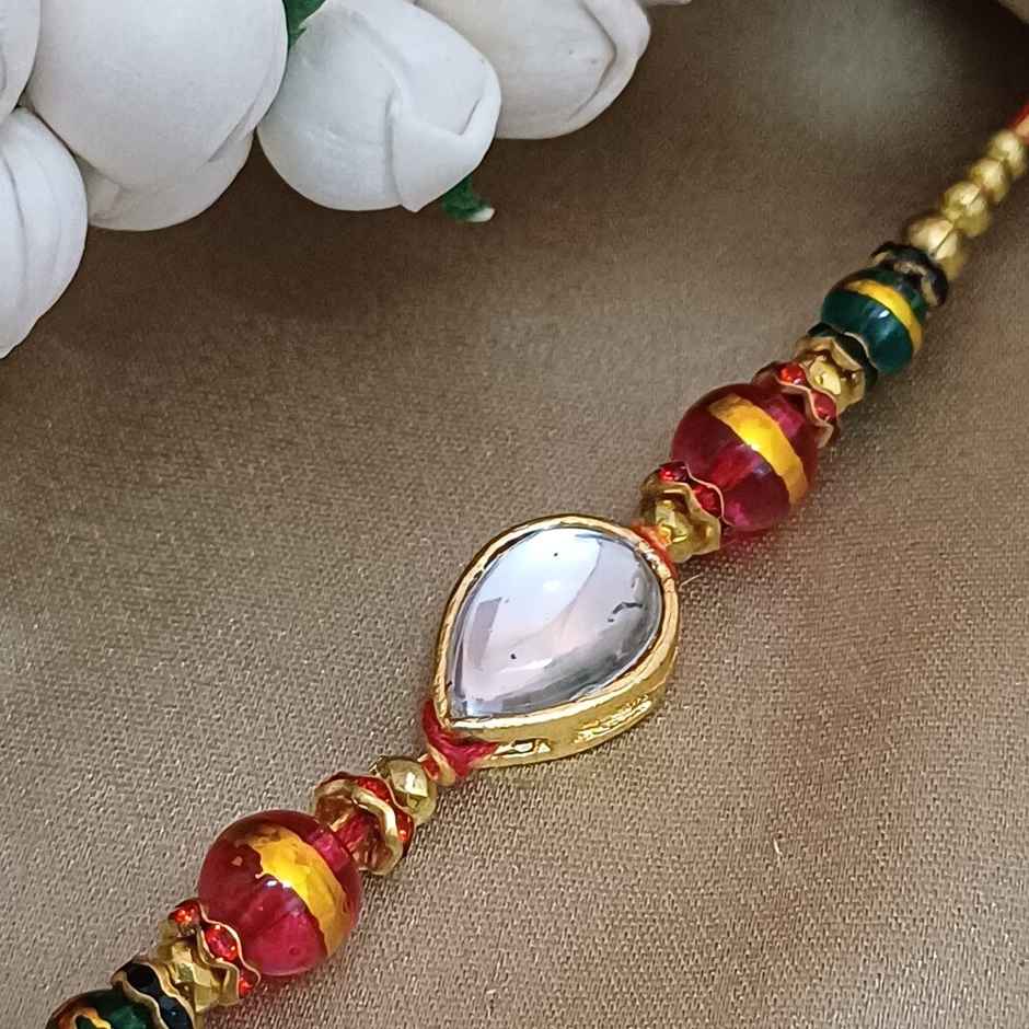 Rain Drop Stone Metal Rakhi | Elegant and Unique | Gullak