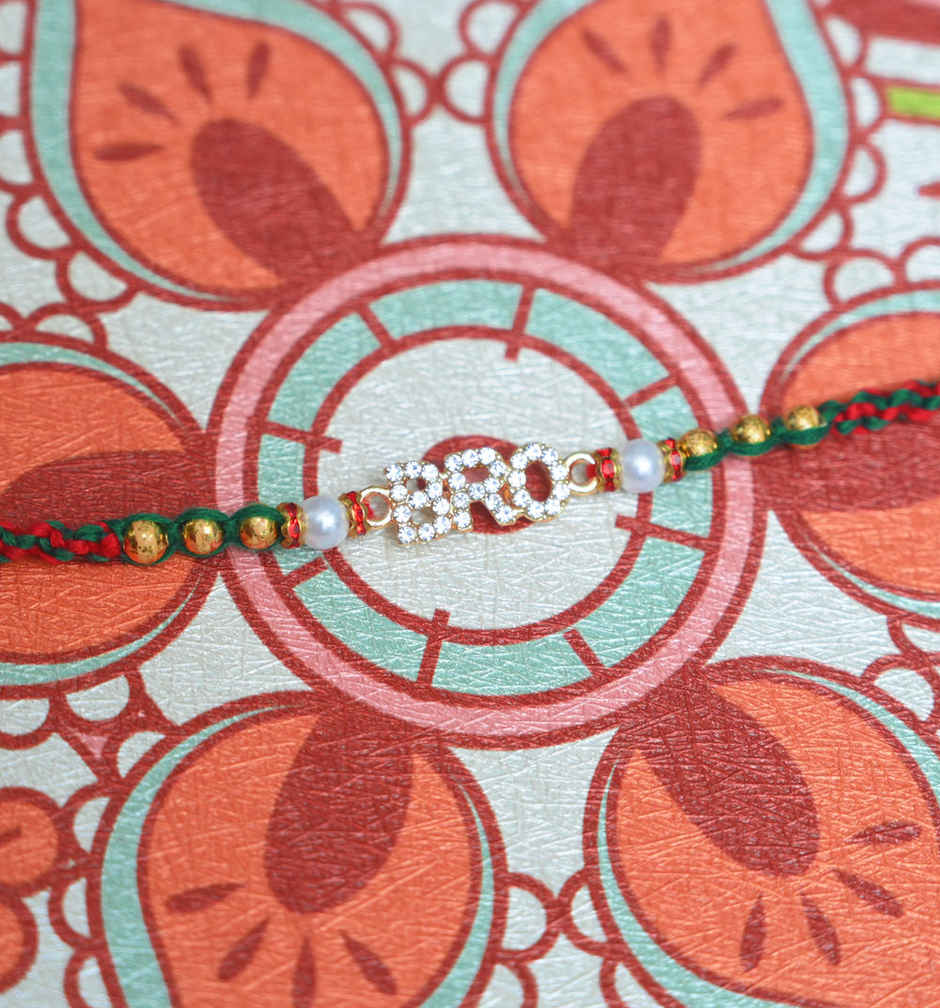 Aurum Cool Bro Rakhi With White & Golden Beads - Trendy and Stylish