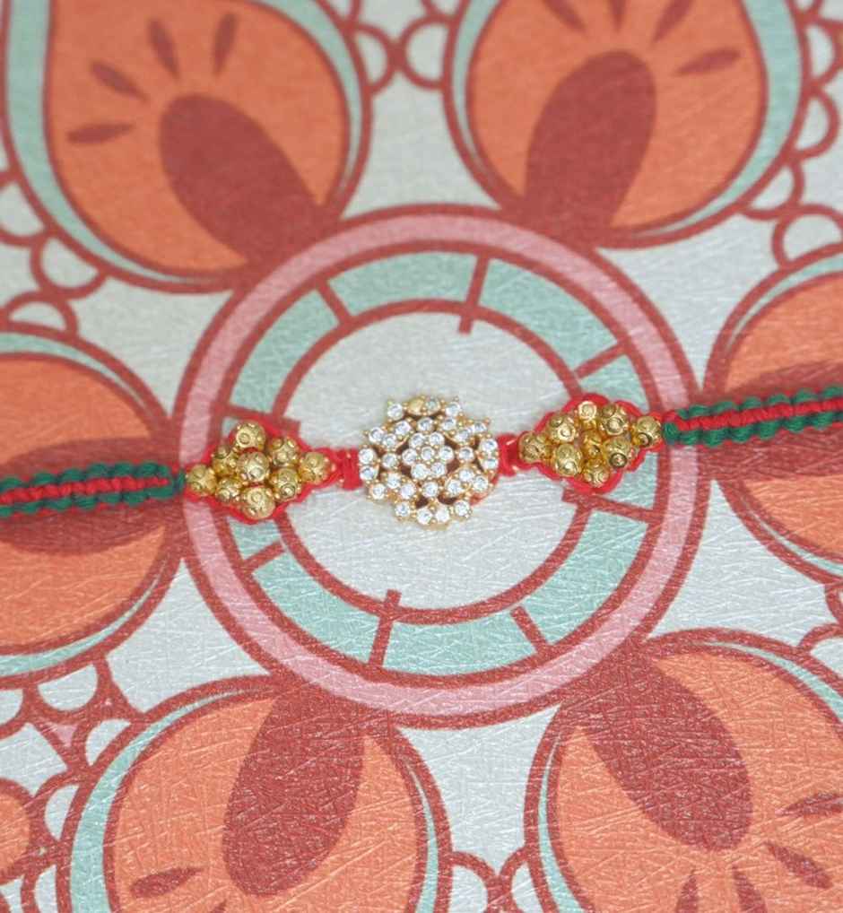 Aurum Diamond Floral Rakhi - with Artwork and Beads