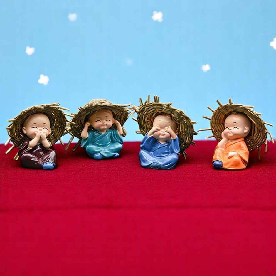 eCraftIndia Whimsical Set of 4 Baby Monk Buddha Statues