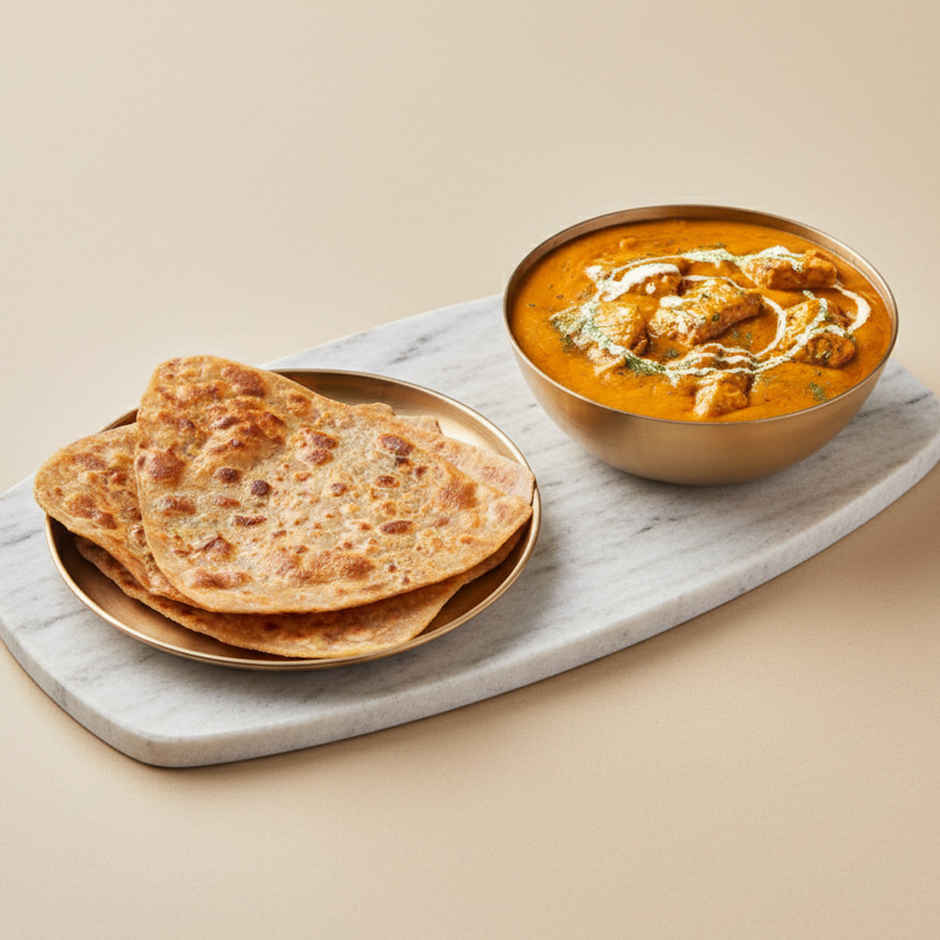 Tawa Plain Paratha (2 pcs) + Butter Chicken