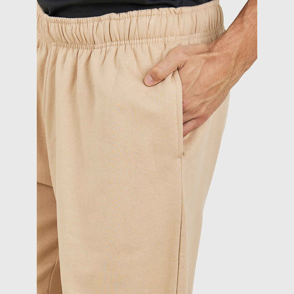 Styli Men's Relaxed Fit Jogger with Zip Pockets and Badge Detail | Beige - L