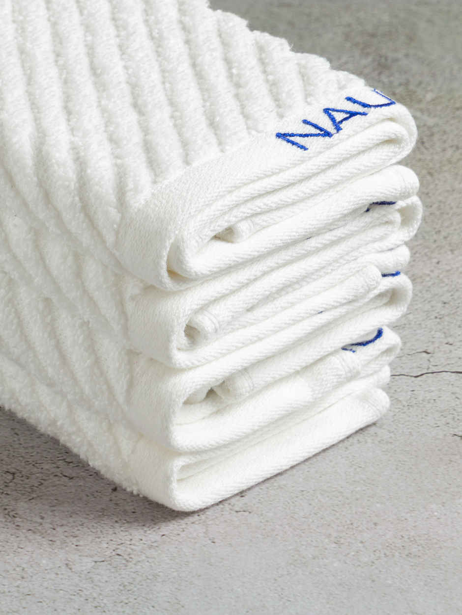 NAUTICA Fluffy Zero Twist 100 Percent Cotton Face Towel | Cross View | Solid White