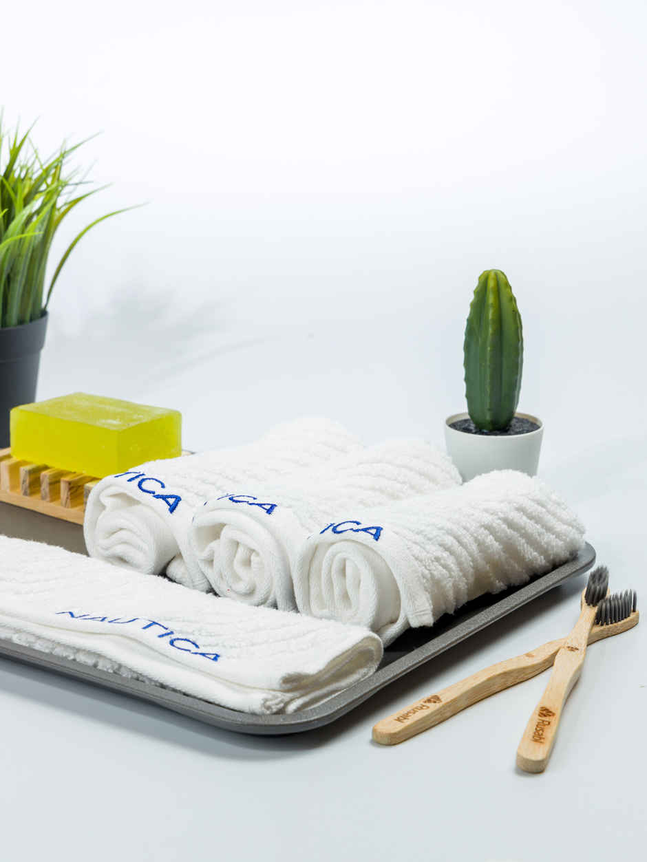 NAUTICA Fluffy Zero Twist 100 Percent Cotton Face Towel | Cross View | Solid White