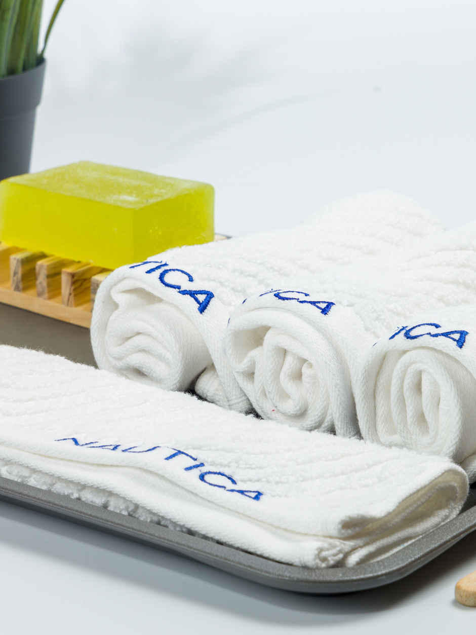 NAUTICA Fluffy Zero Twist 100 Percent Cotton Face Towel | Cross View | Solid White