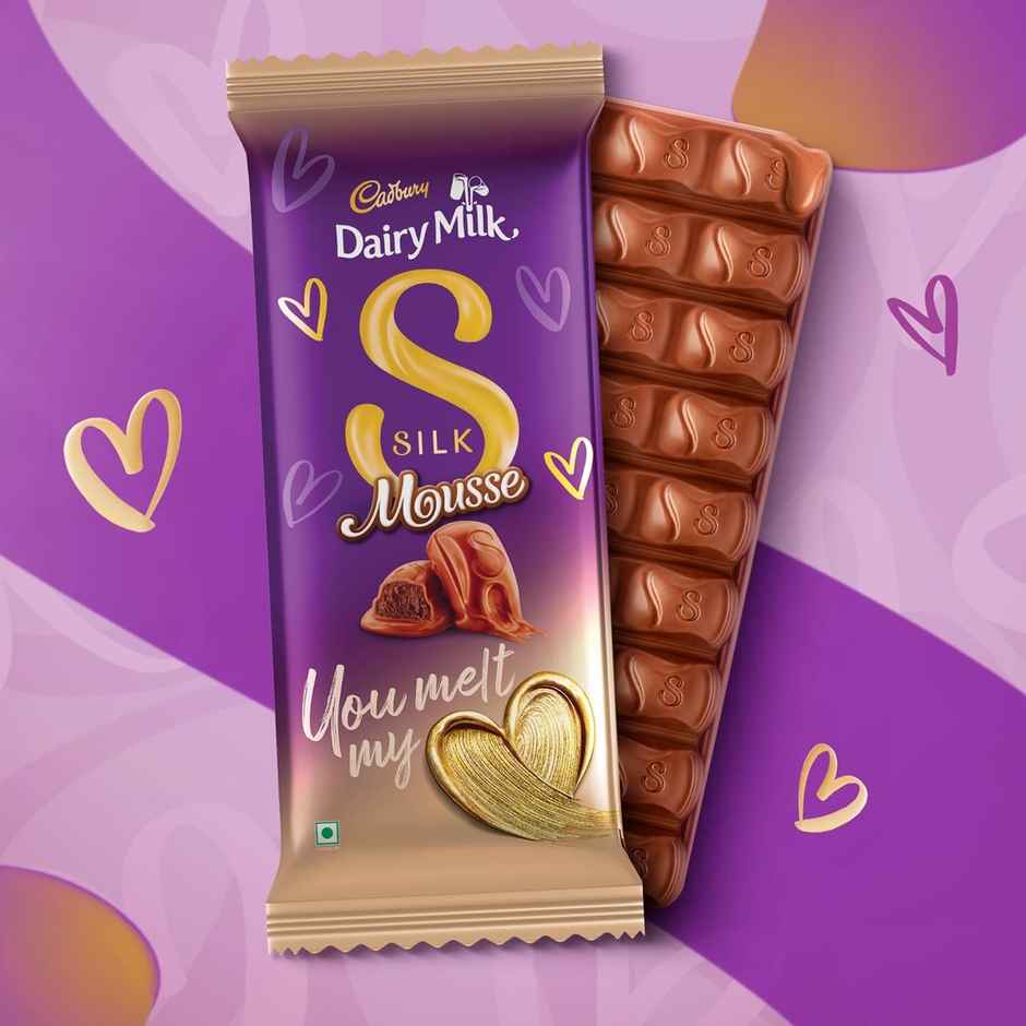 Fnp Magic Of Red Roses In Sleeve(1pc) & Cadbury Dairy Milk Silk Mousse Chocolate Bar(50gms) Combo