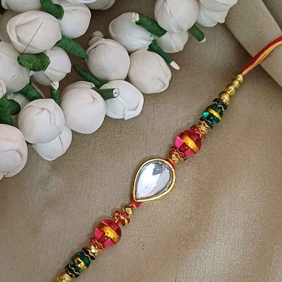 Rain Drop Stone Metal Rakhi | Elegant and Unique | Gullak