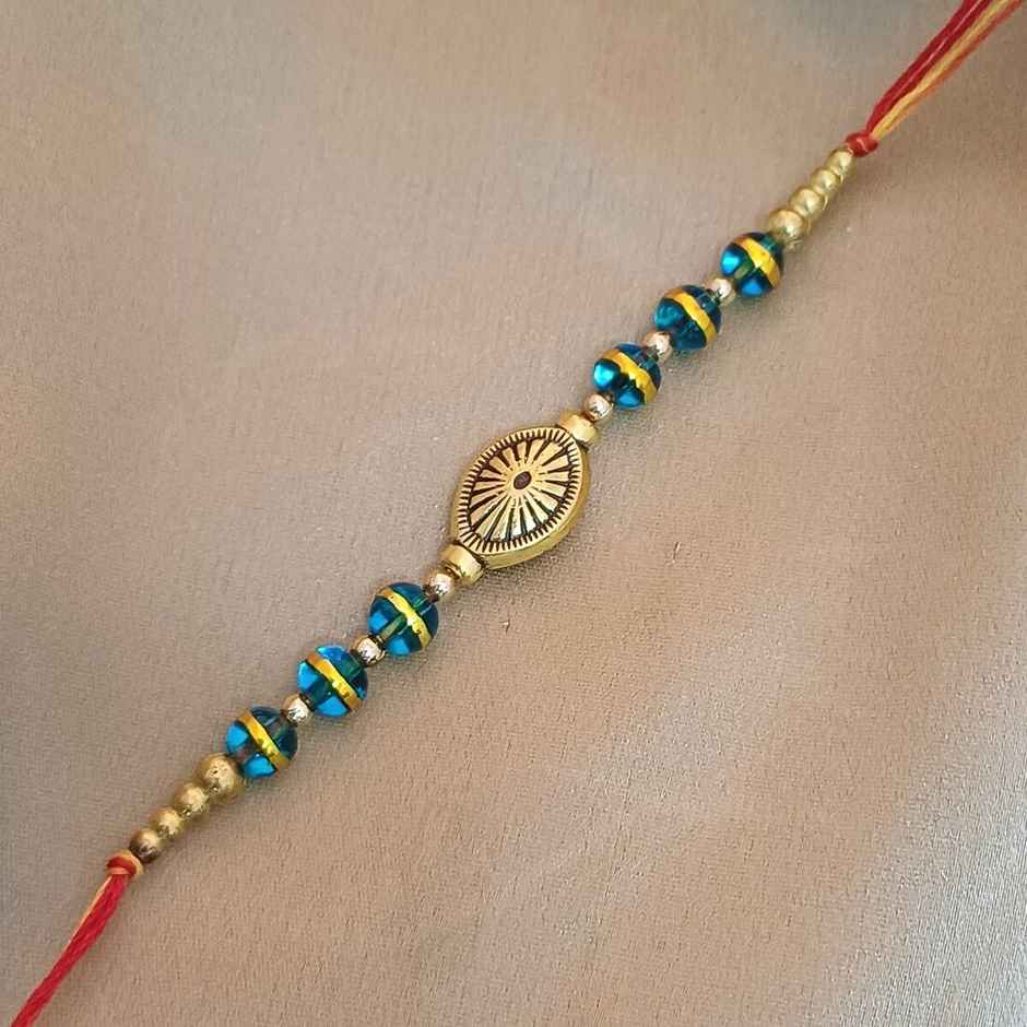 Gullak Oval Chakra Rakhi - Glass Beads