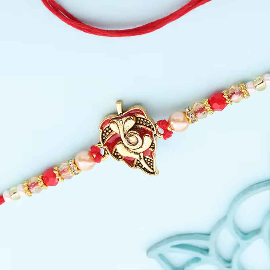 Religious Auspicious Ganesha Charm Rakhi (Floweraura)