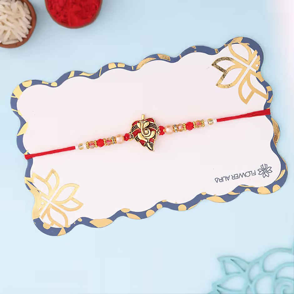 Religious Auspicious Ganesha Charm Rakhi (Floweraura)