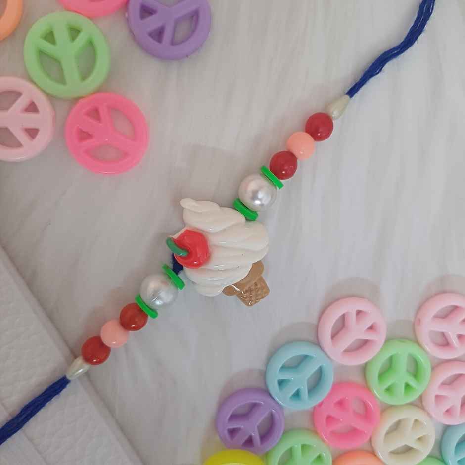 Nestle Kitkat Crispy & Creamy 4 Finger Chocolate Coated Wafer(38.5gms) & Ice Cream Cone Rakhi For Kids(1pc) Combo