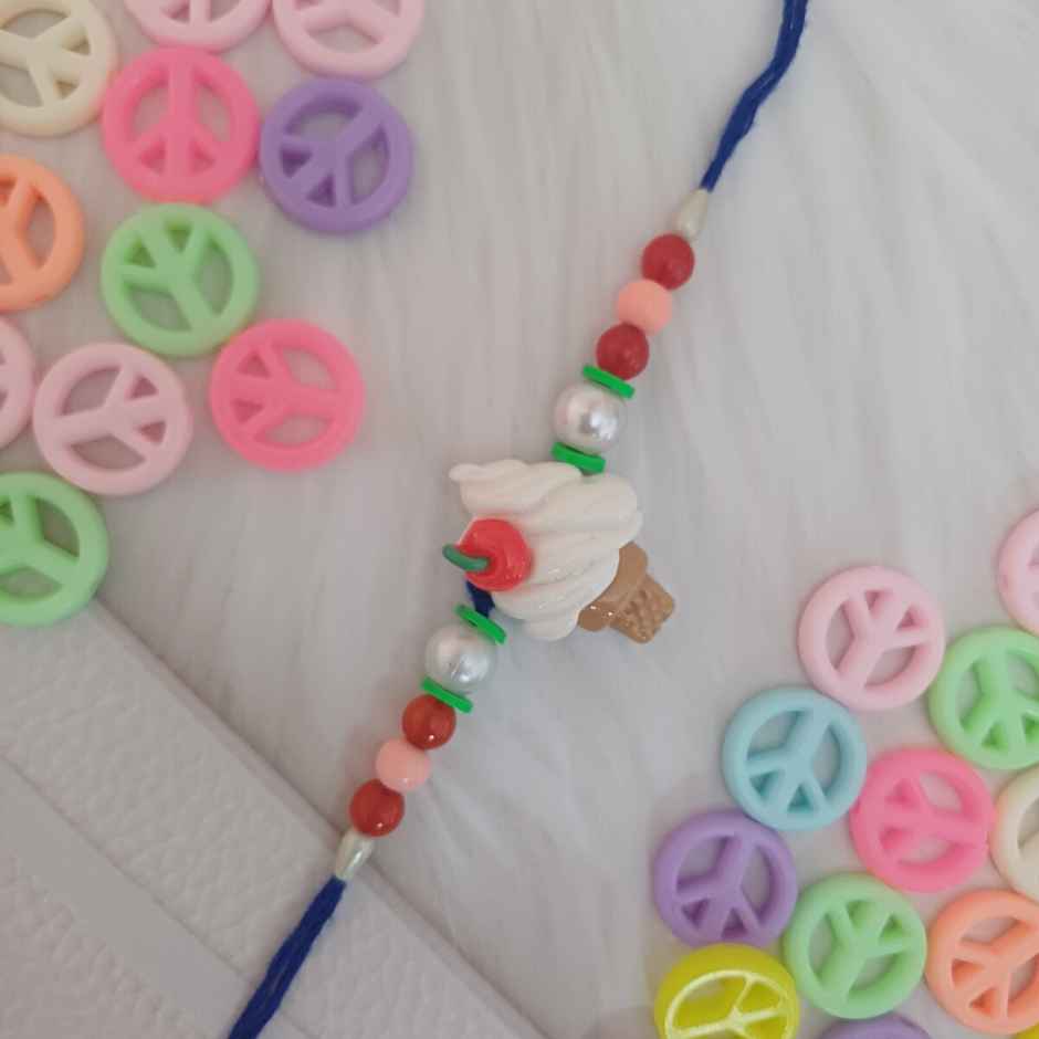 Nestle Kitkat Crispy & Creamy 4 Finger Chocolate Coated Wafer(38.5gms) & Ice Cream Cone Rakhi For Kids(1pc) Combo