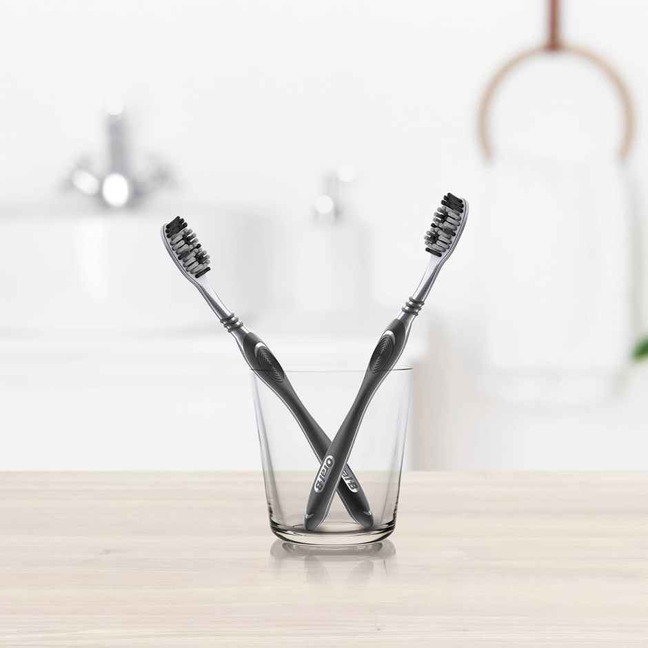 Oral B Cavity Defense Black Manual Toothbrush For Adults With Charcoal Extract- Medium Pack Of 4