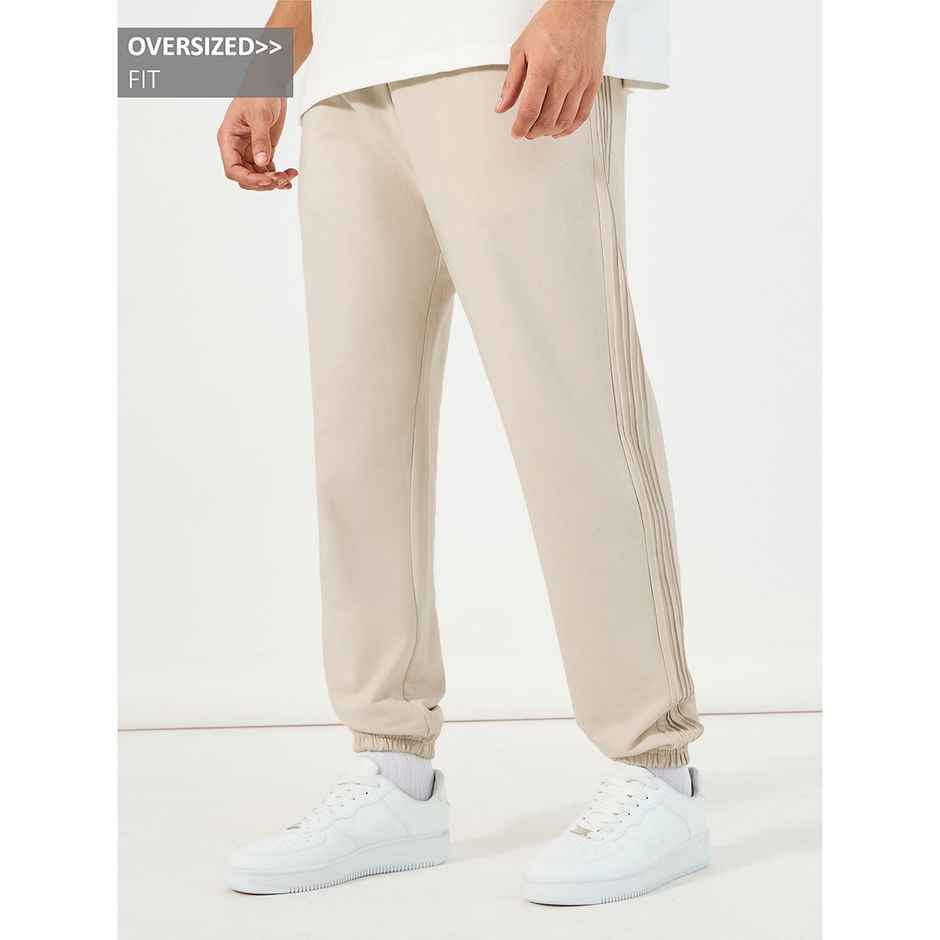 Styli Men's Jogger with Oversized Fit, Pintucks and Embroidery | Off White - L