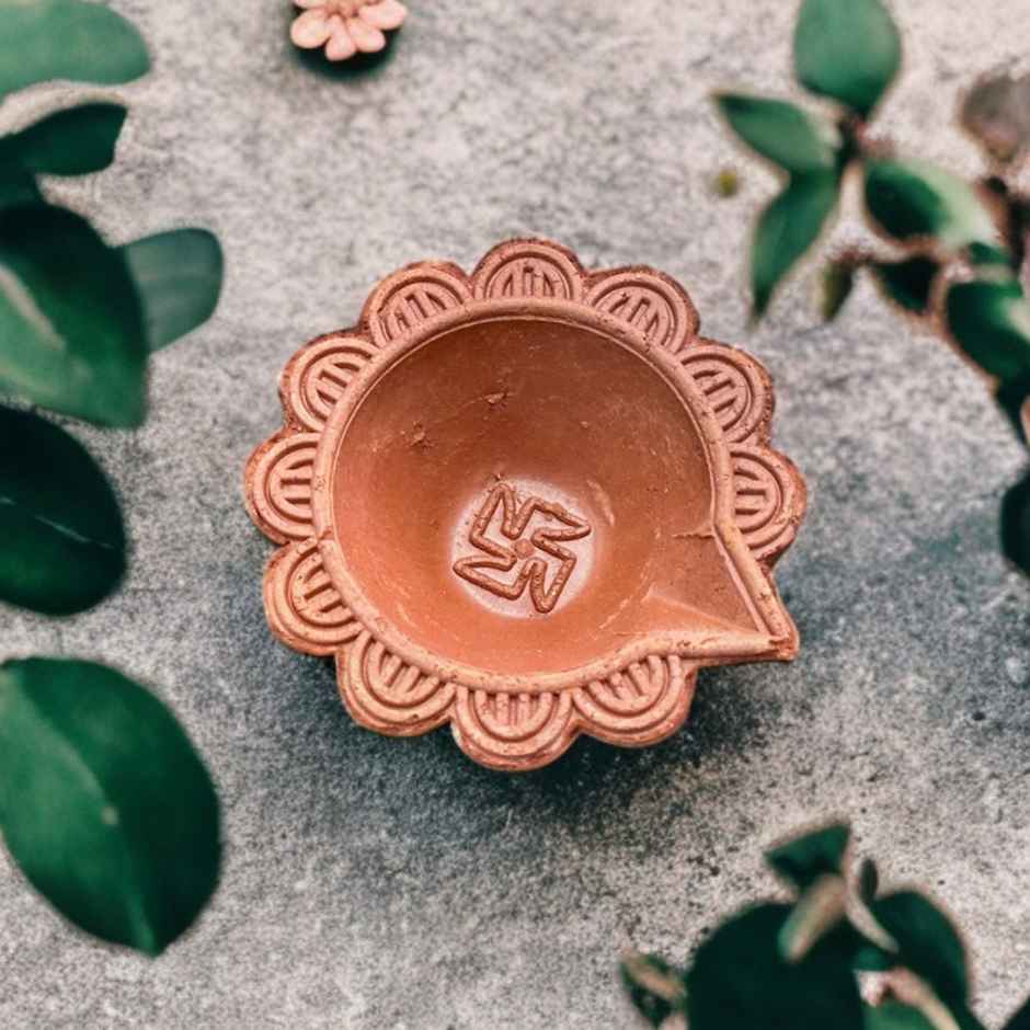 Crafted Pushp Swastik Mitti Diya | Pack of 12 | Clay Diya | DiaCraft
