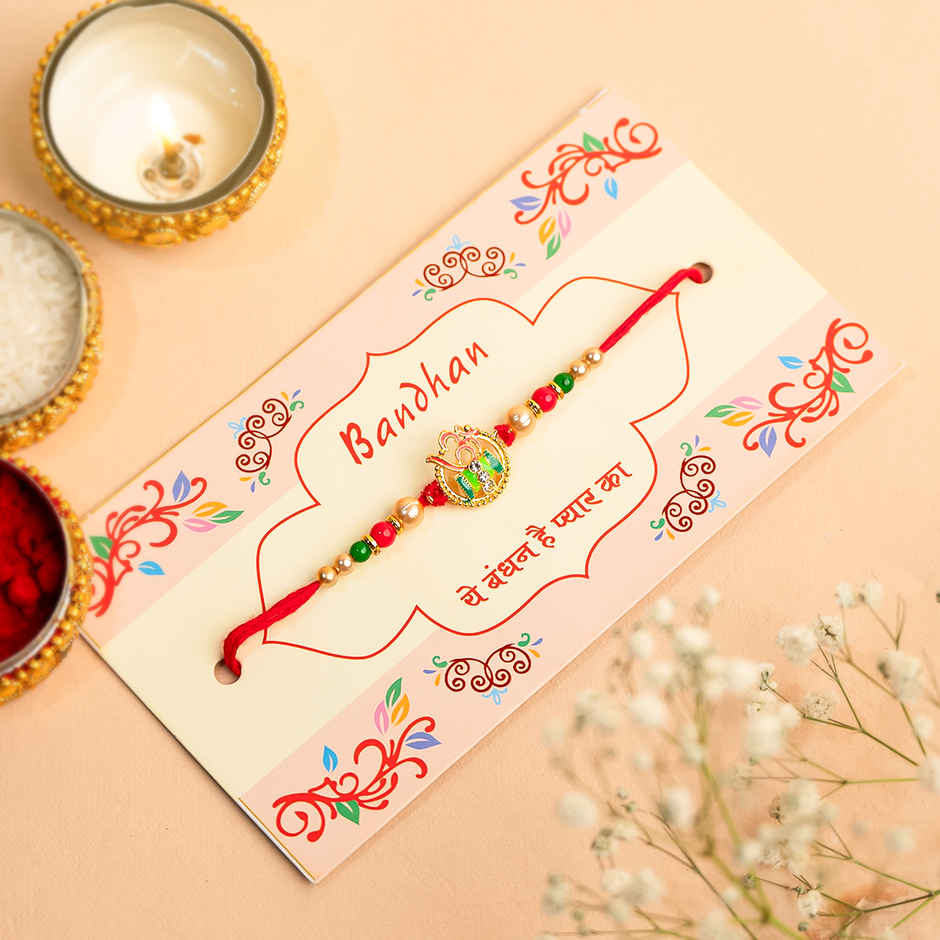 Rakhi for Brother | Divine Om-Damru Shakti & Meenakari | Religious | Pack of 1 | Tomuncle