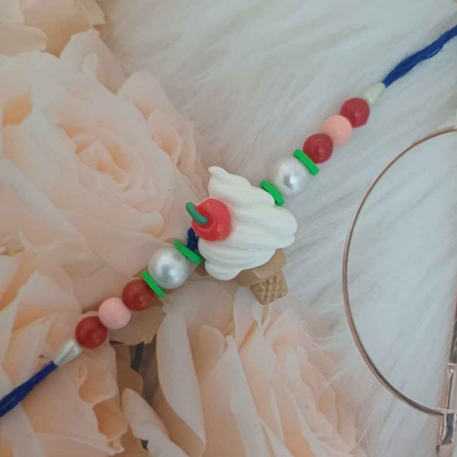 Nestle Kitkat Crispy & Creamy 4 Finger Chocolate Coated Wafer(38.5gms) & Ice Cream Cone Rakhi For Kids(1pc) Combo