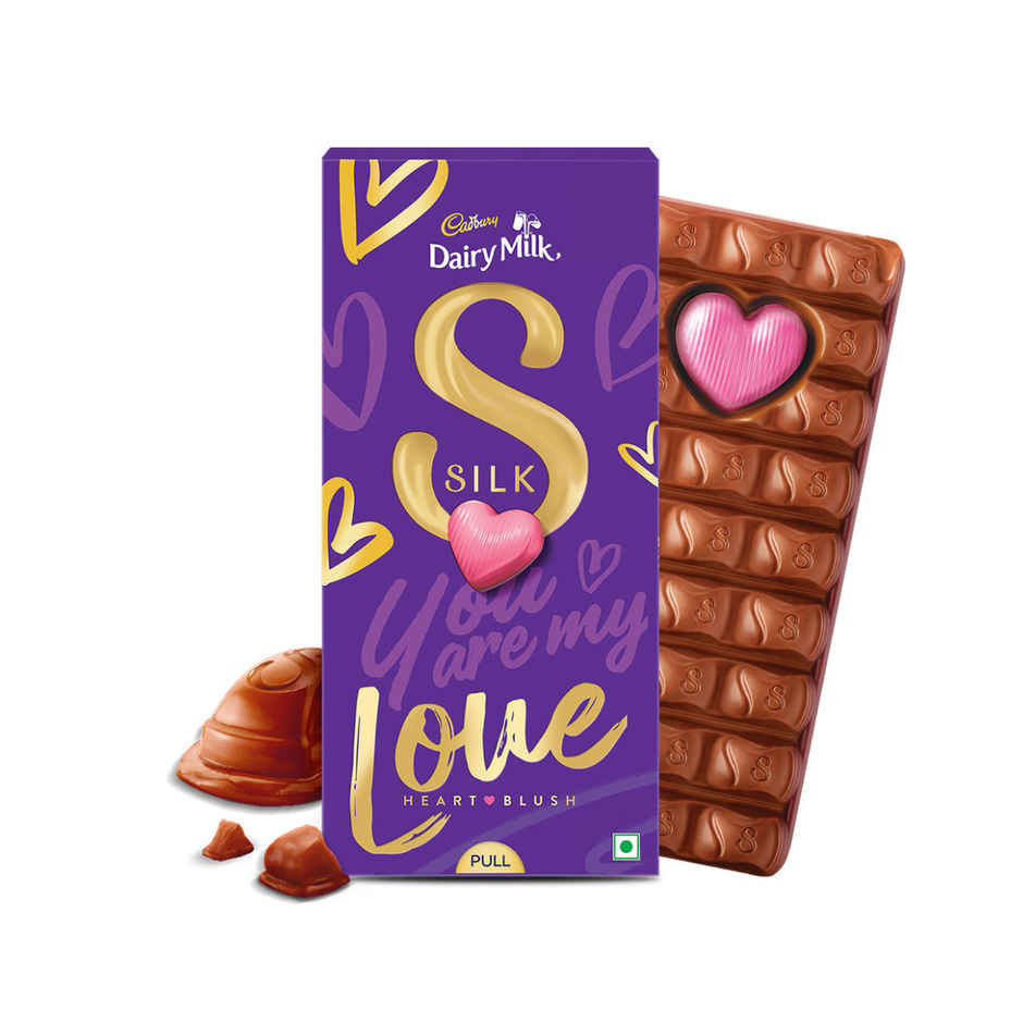 Cadbury Dairy Milk Silk Valentines Heart Blush Chocolate Bar Gift Pack(250gms), Carlton London Escape Perfume Women(100ml) & FNP Radiant Red Rose Bouquet(1pc) Combo