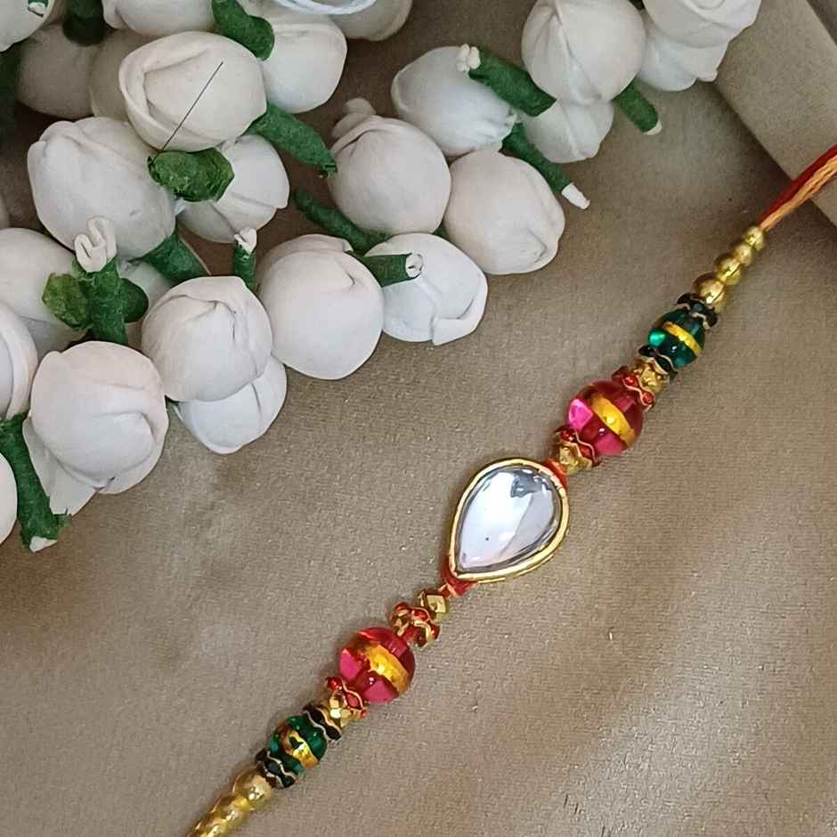 Rain Drop Stone Metal Rakhi | Elegant and Unique | Gullak