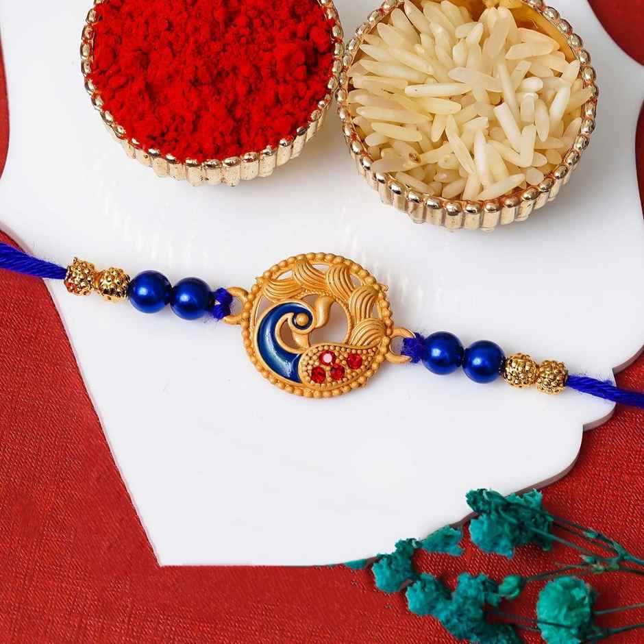 Peacock Blue Golden Designer Rakhi for Brother, Bhai, and Bhaiya with Roli Chawal Pack (eCraftIndia)