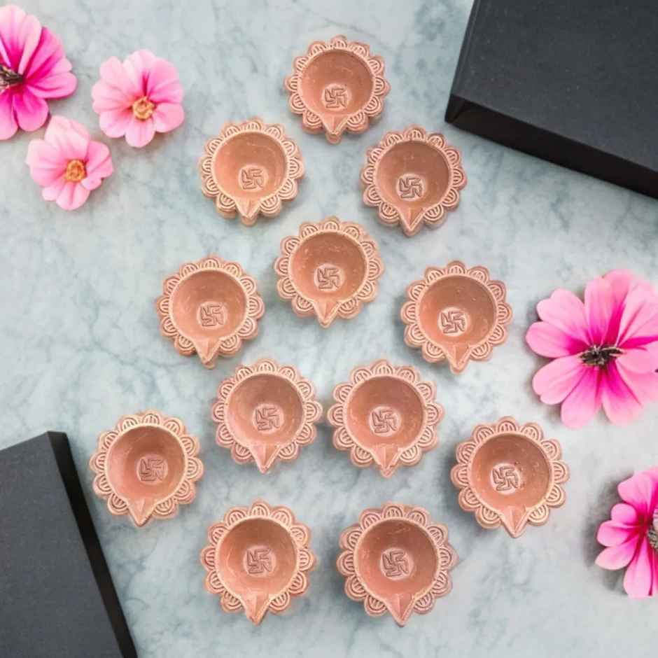 Crafted Pushp Swastik Mitti Diya | Pack of 12 | Clay Diya | DiaCraft