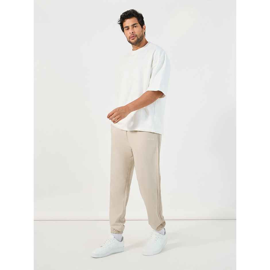 Styli Men's Jogger with Oversized Fit, Pintucks and Embroidery | Off White - L