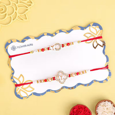 Stone Pearl Studded Rakhis (Floweraura) Set of 2